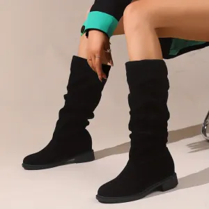Round toe boots with medium shaft height for women