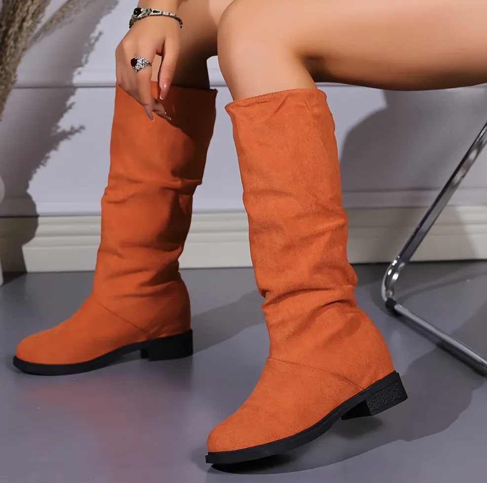 Round toe boots with medium shaft height for women