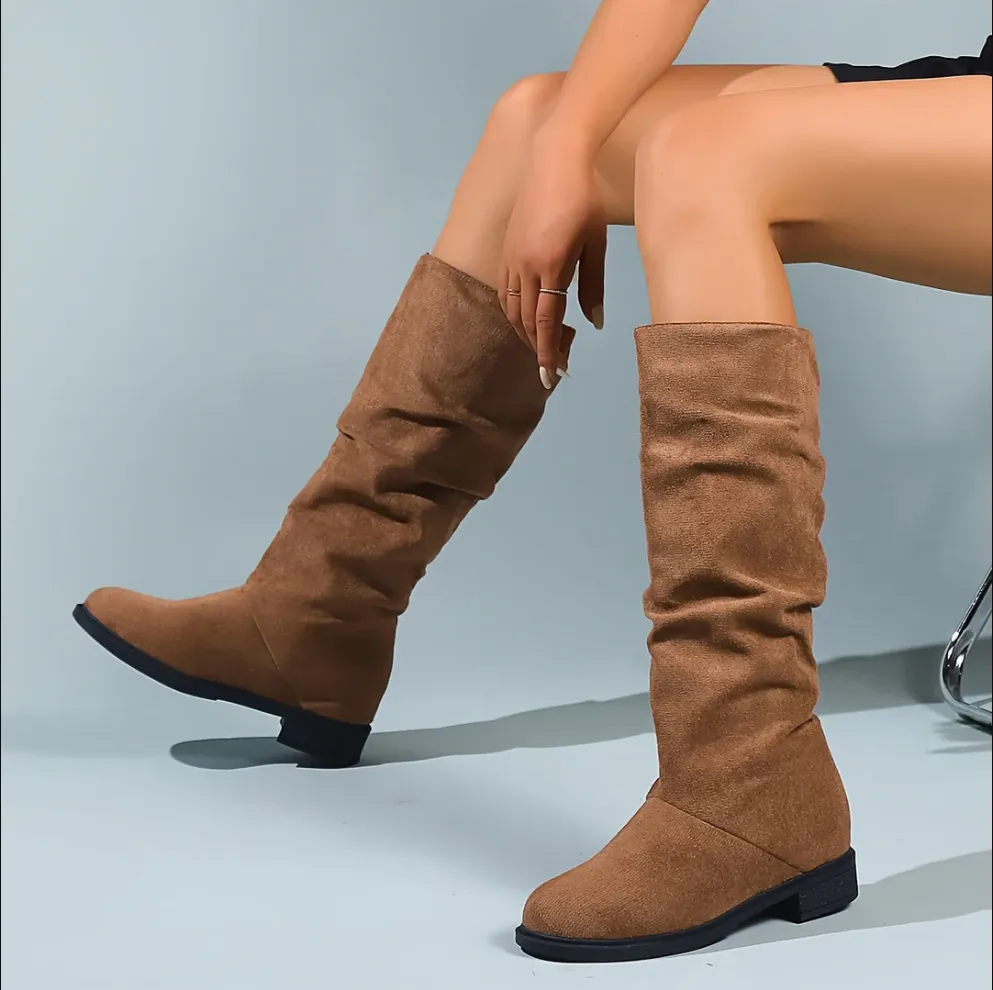 Round toe boots with medium shaft height for women